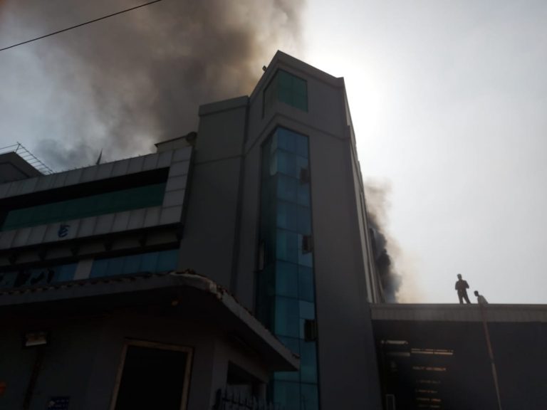 Smoke billows from factory fires