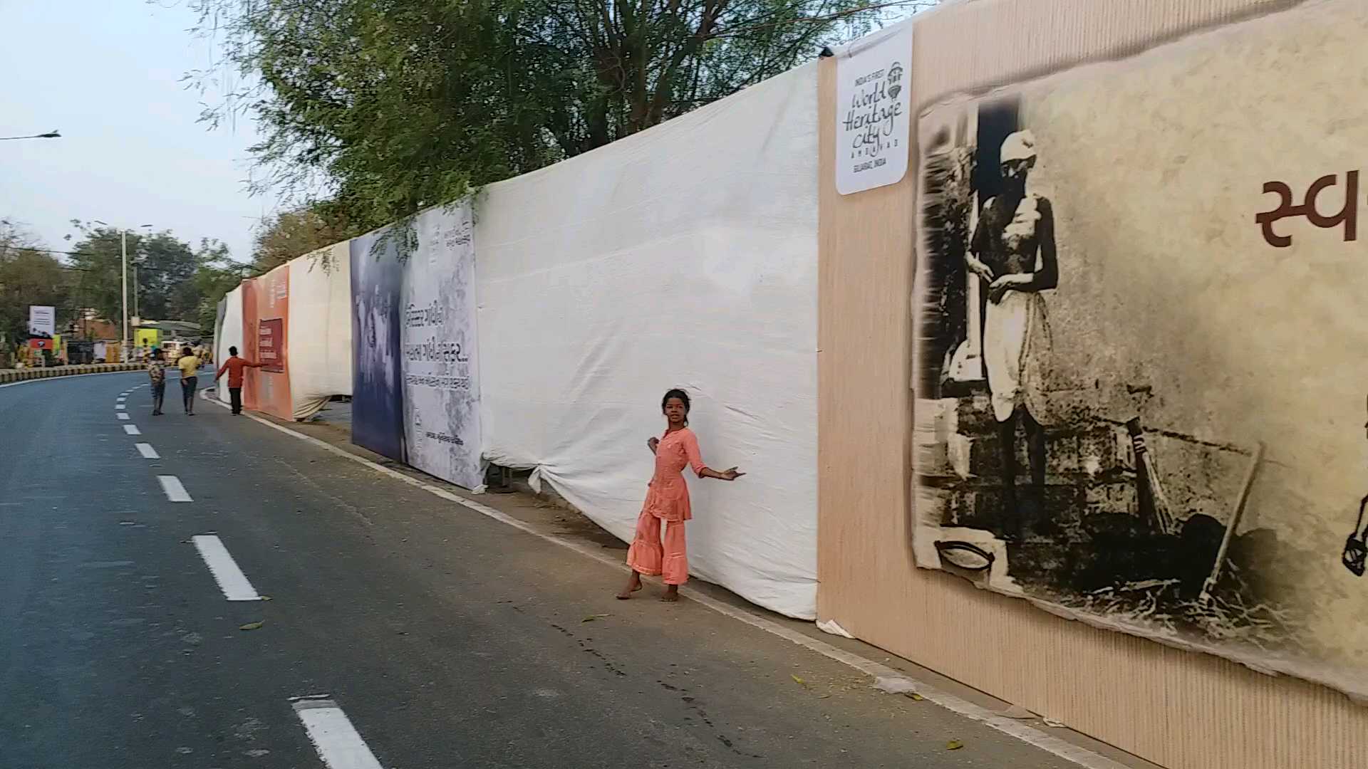 White curtains erected in Ahmedabad to cover the poor before the arrival of Prime Minister Narendra Modi