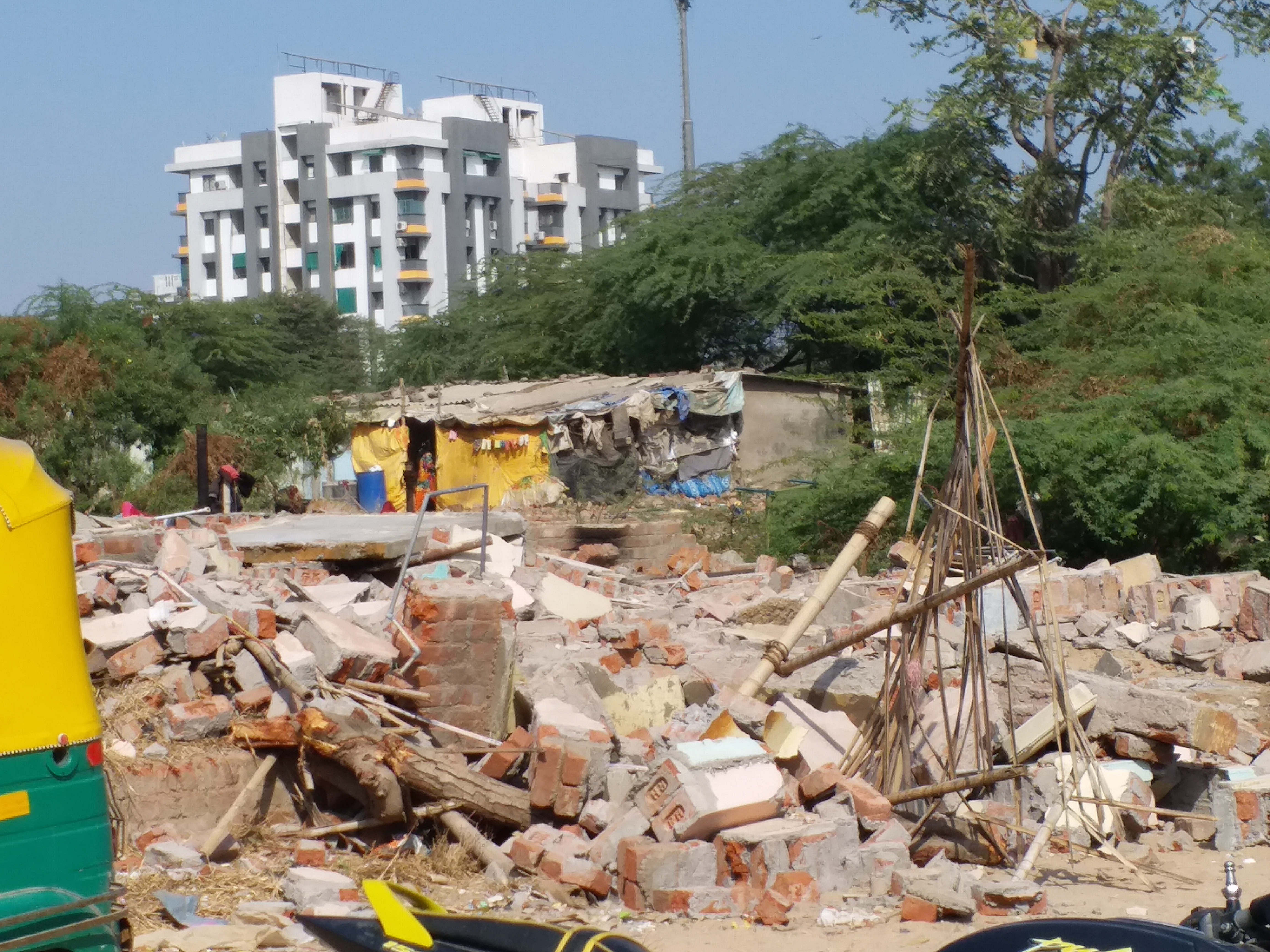 ahmedabad municipal corporation demolished houses for metro rail project