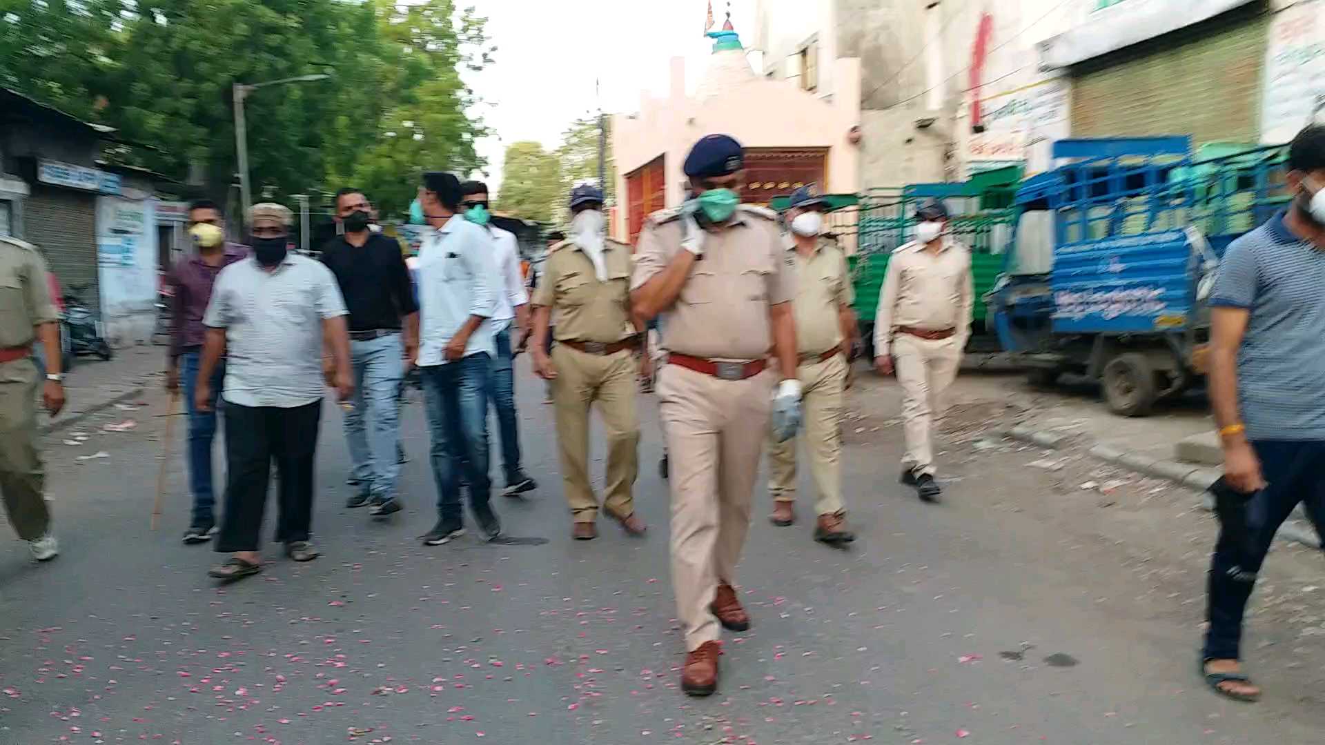 the people greeted policemen with flowers in ahmedabad gujarat