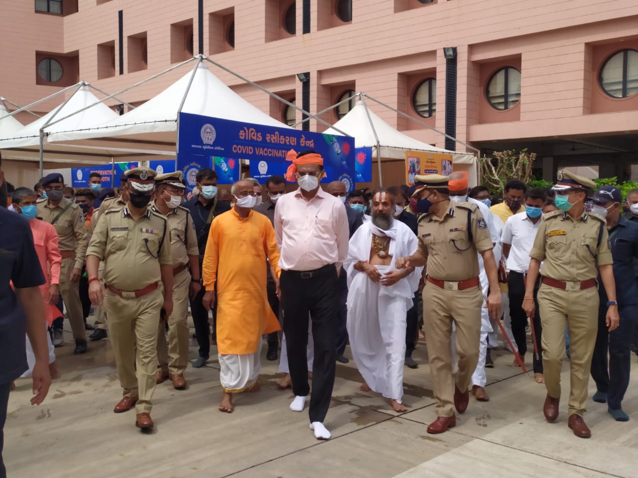 DyCM Nitin Patel launches covid vaccination in Jagannath Temple