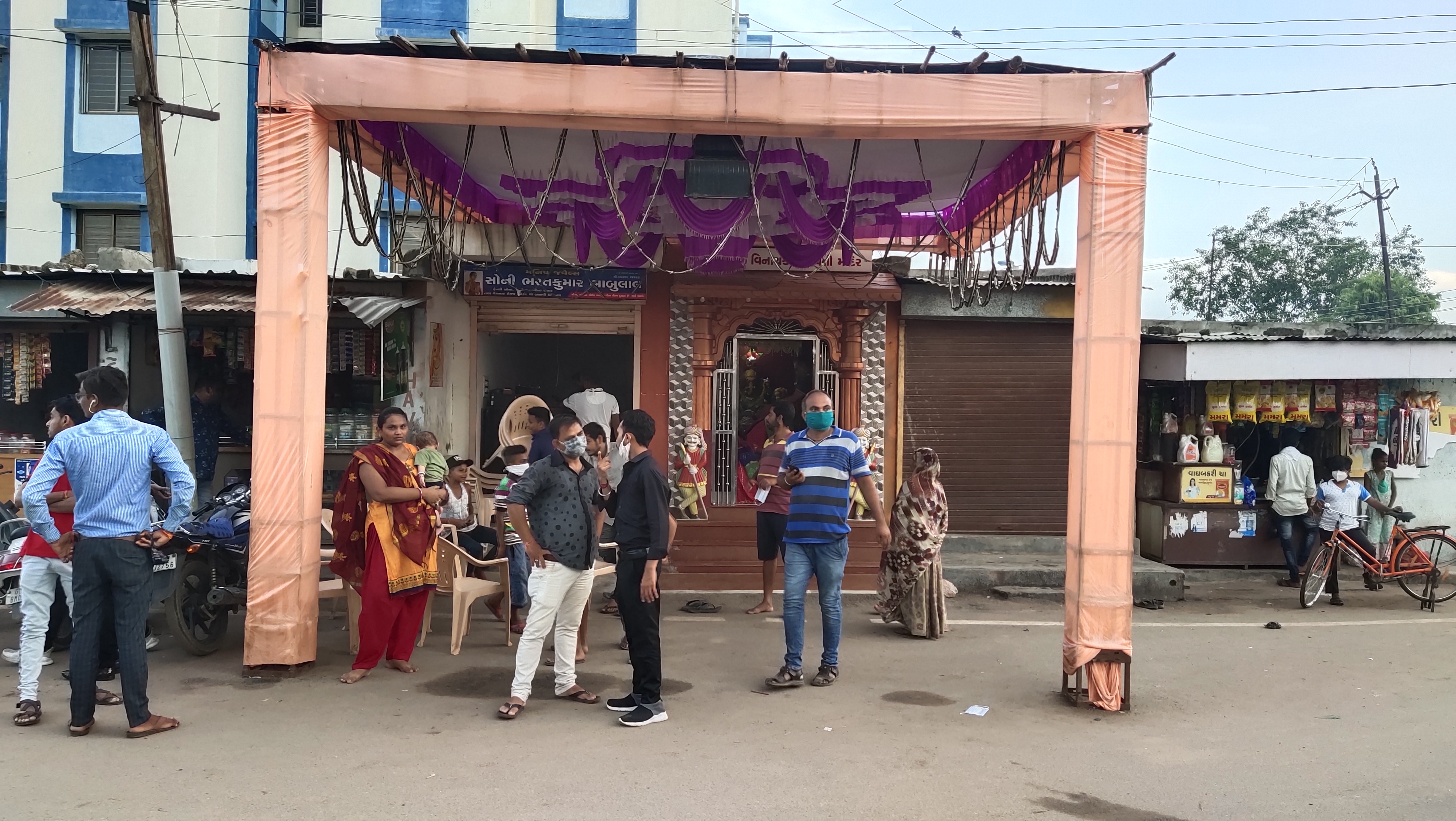 Distribution of sanitizers and masks in form of prasad at Ganpati Utsav