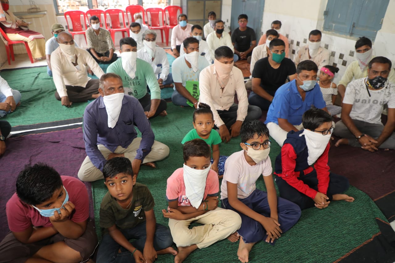 Parents lined up to get admission in a government school in Ghoghavdar village of Gondal