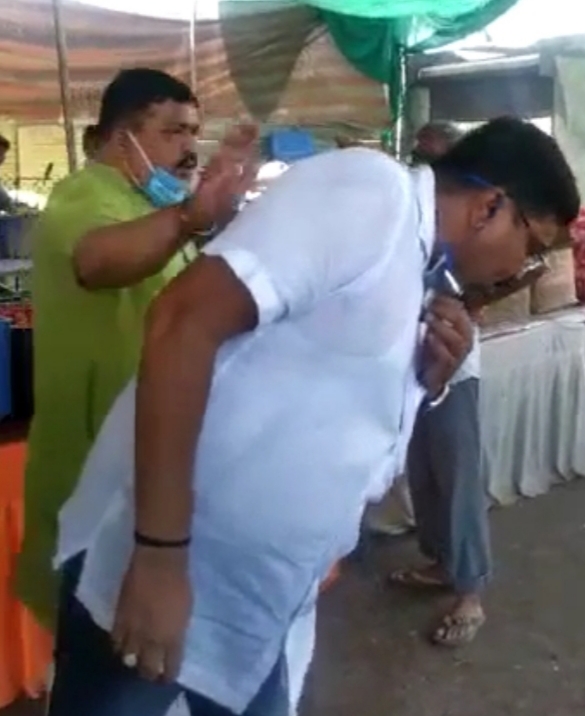 former bjp mla spitting on road