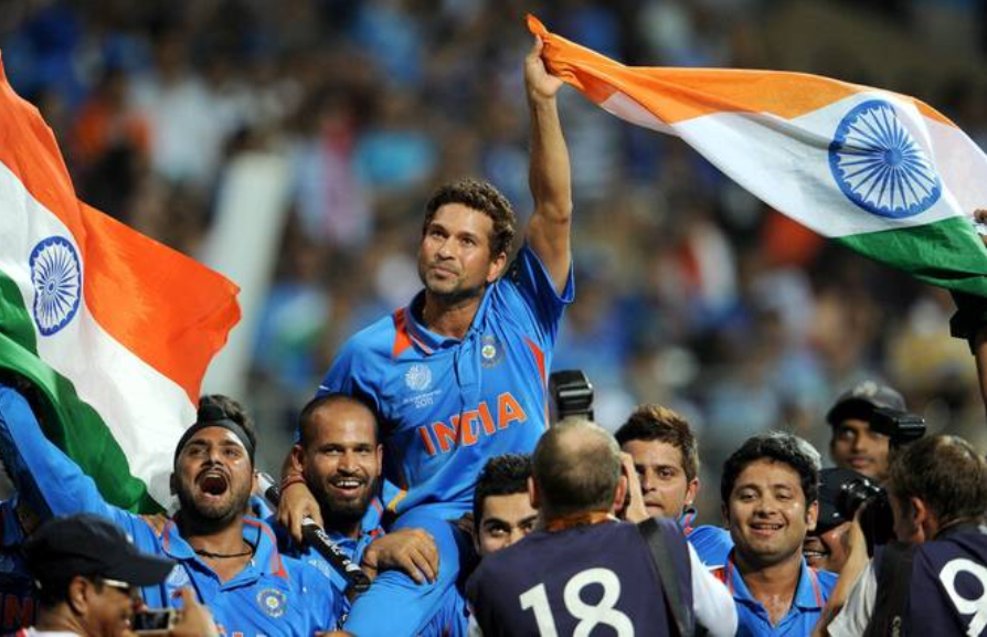 Sachin Tendulkar is being carried on shoulders by Indian players after winning the 2011 World Cup.