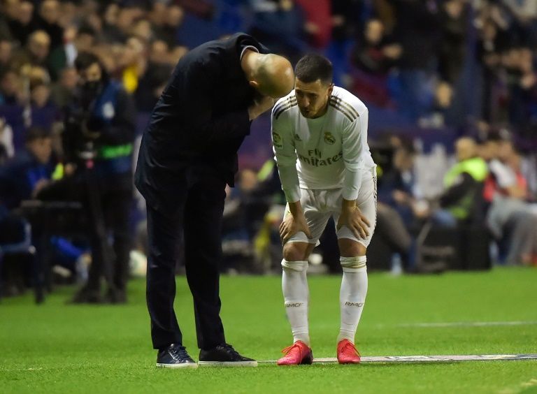 Eden Hazard with coach Zinedine Zidane