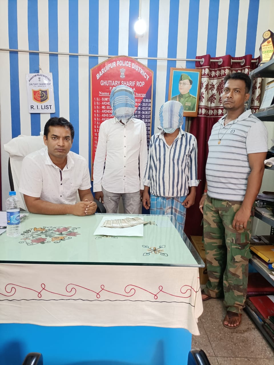 rs 50,000 looted from home guard at canning, 2 fraudsters arrested