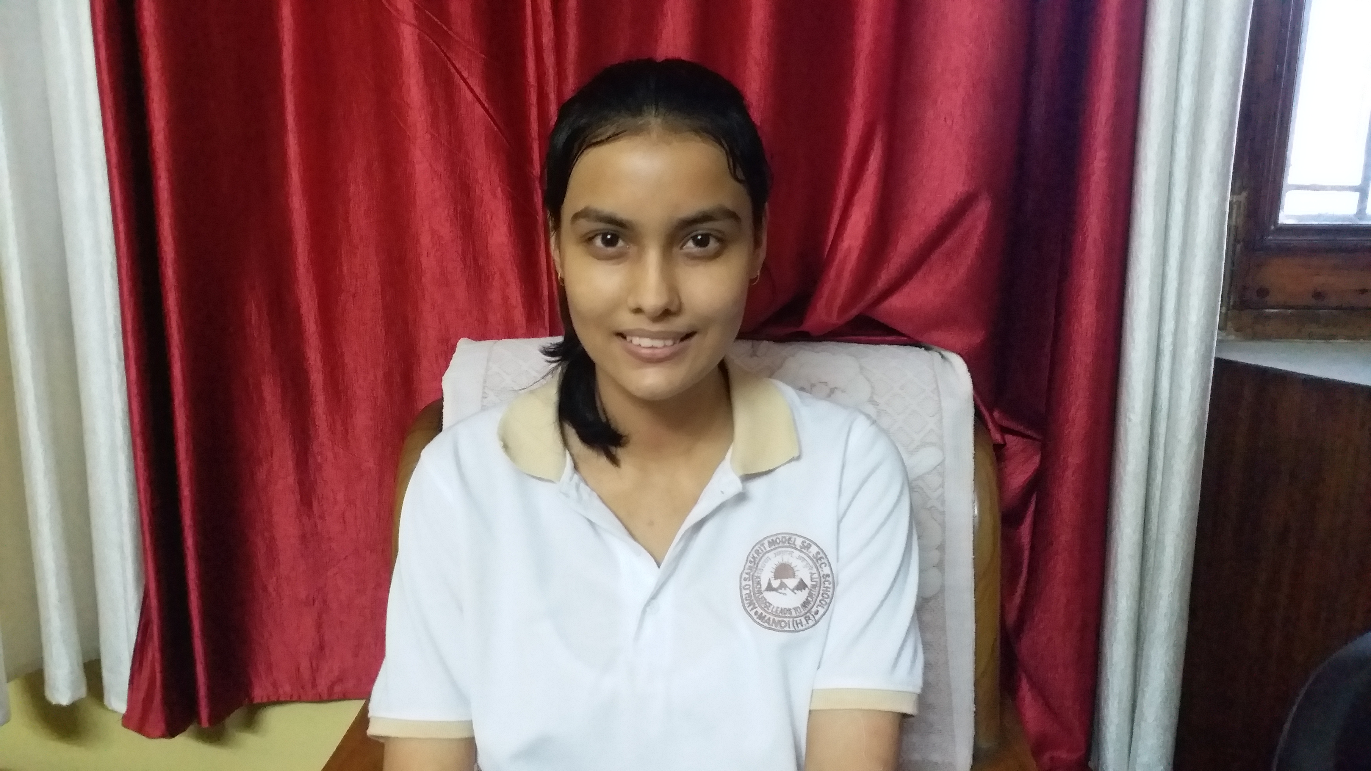 Devangi Sharma secured first place in Himachal Board