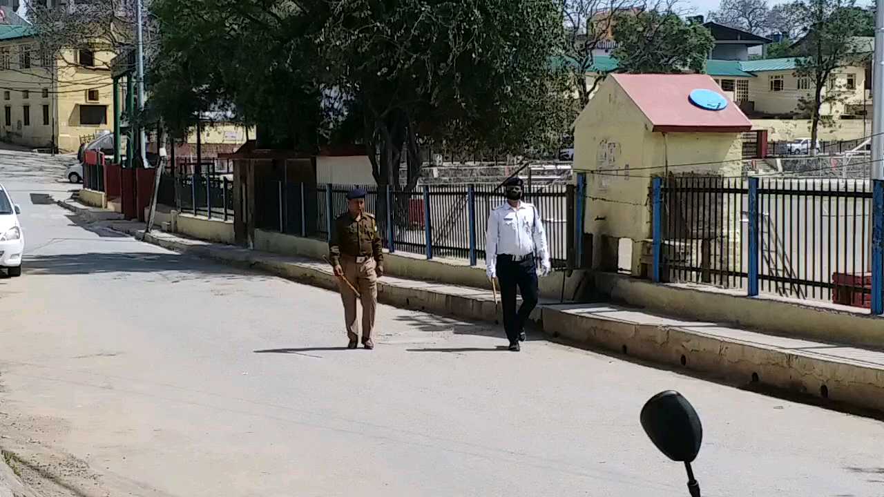 Police patrolling during curfew