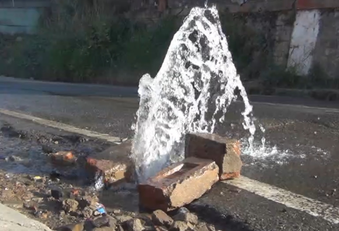 Water flowing on the road in Solan