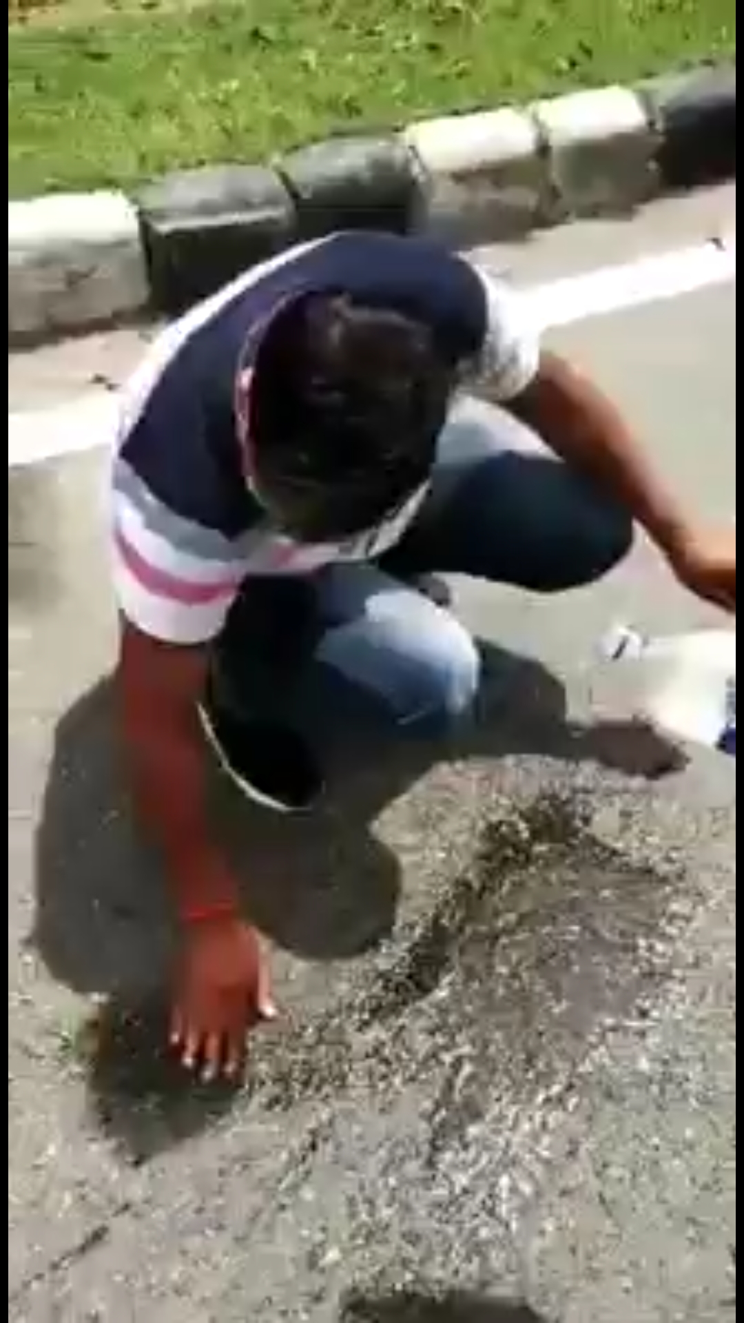 Bike driver spitting on the road in chandigarh