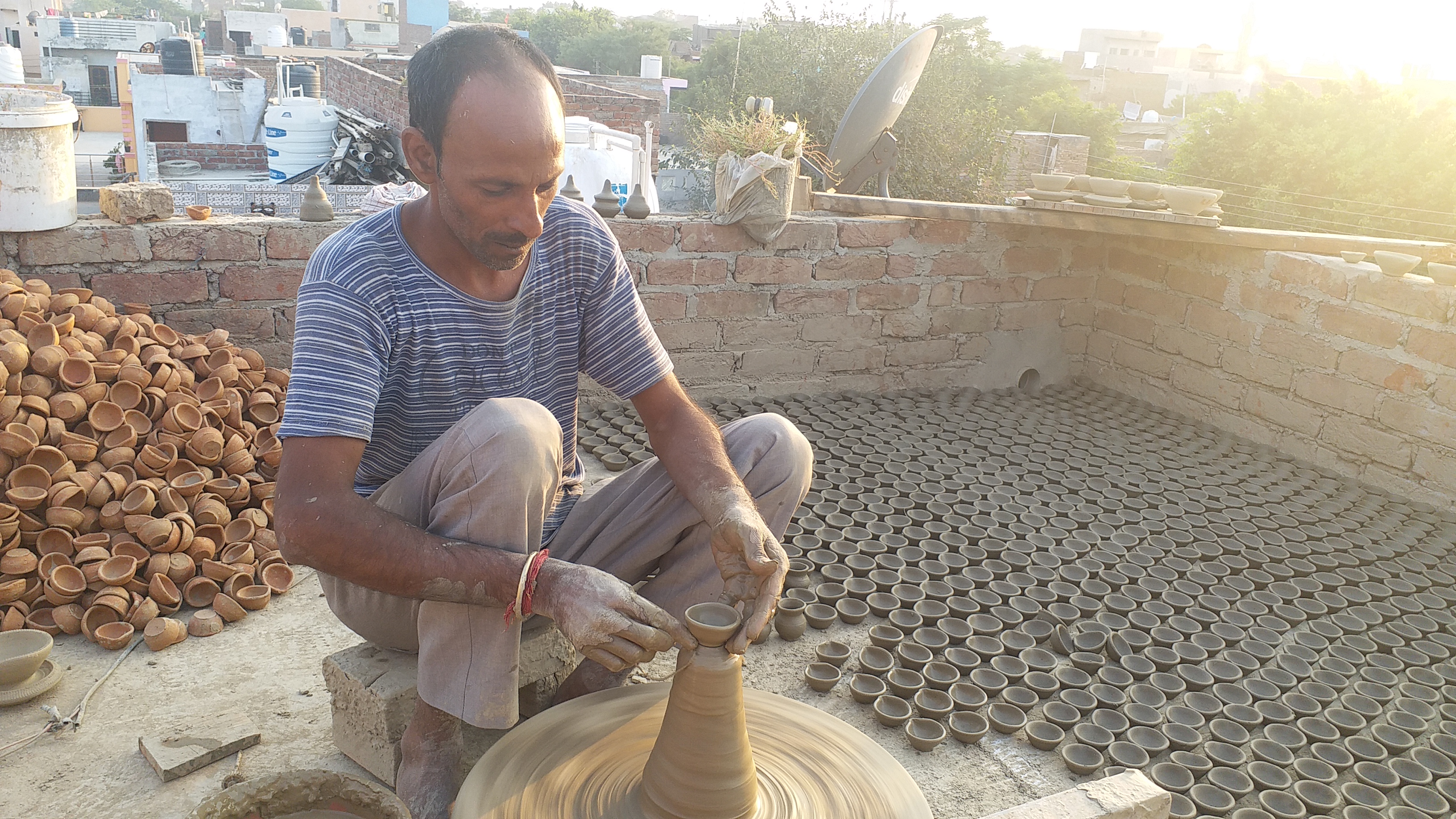 faridabad pot makers express their happiness for increasing demand of diyas due to china boycott