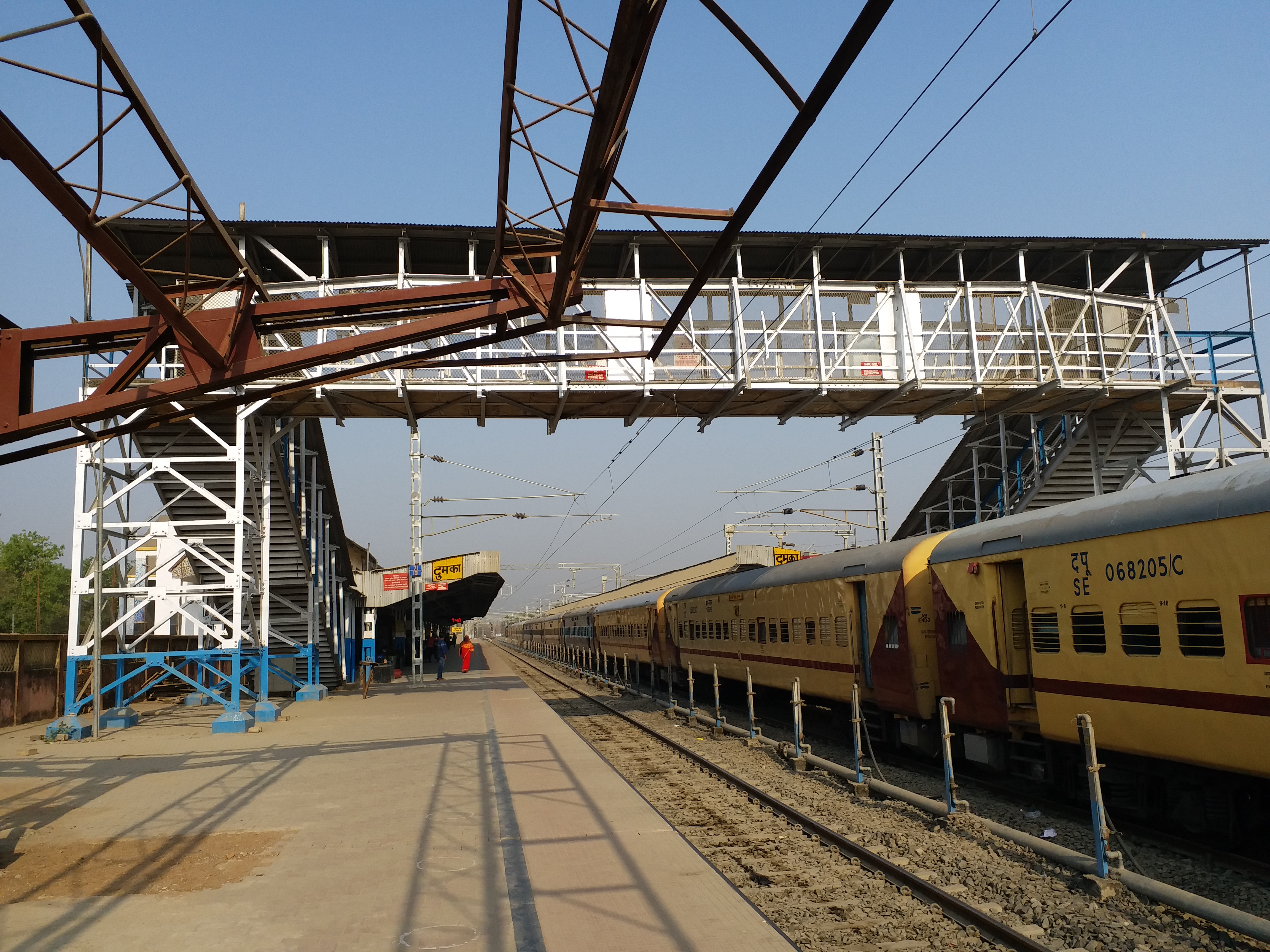 People crossing tracks at Dumka station