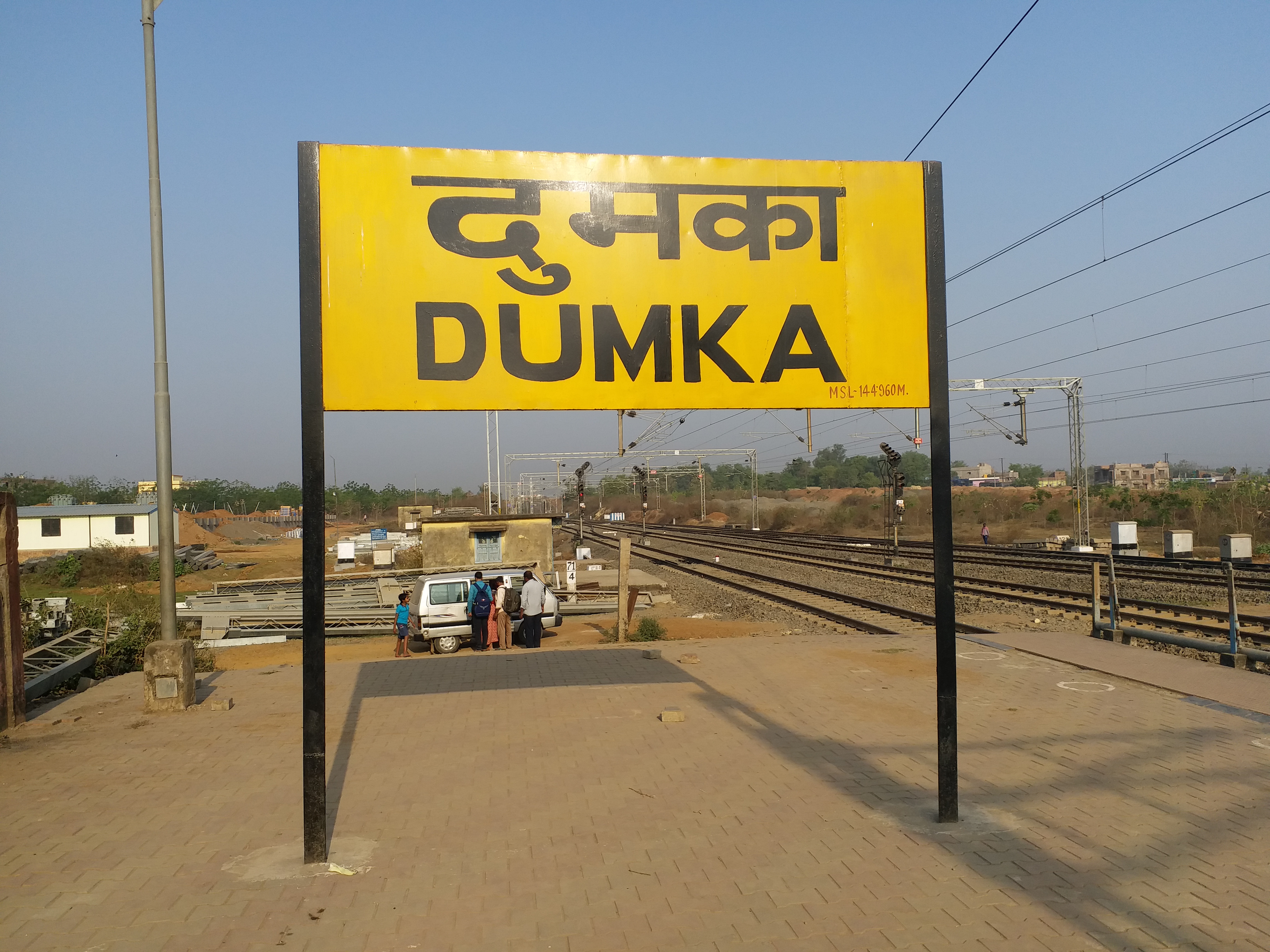 People crossing tracks at Dumka station