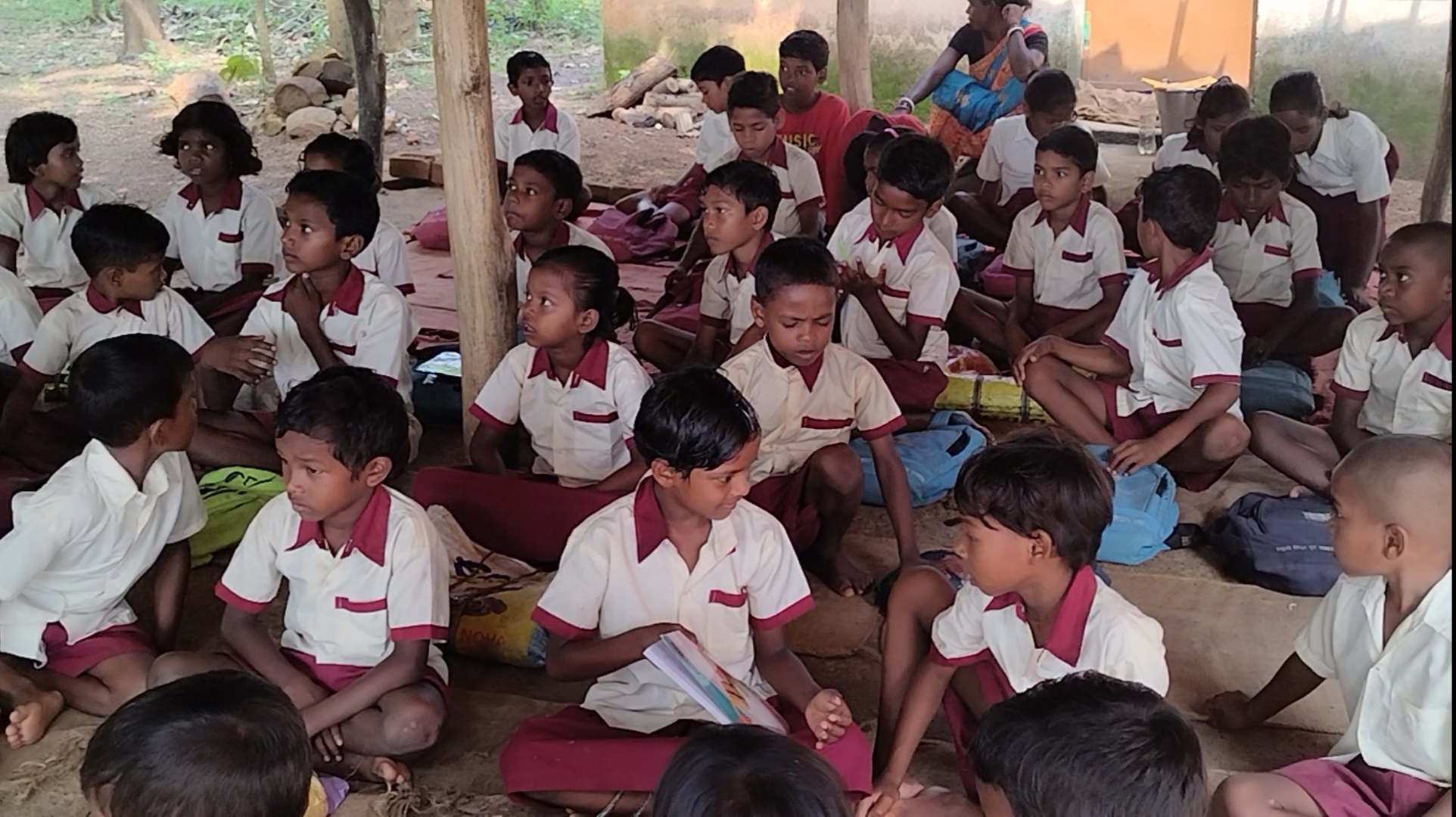 Children study in hut at Kendposhi Primary School in Ghatshila