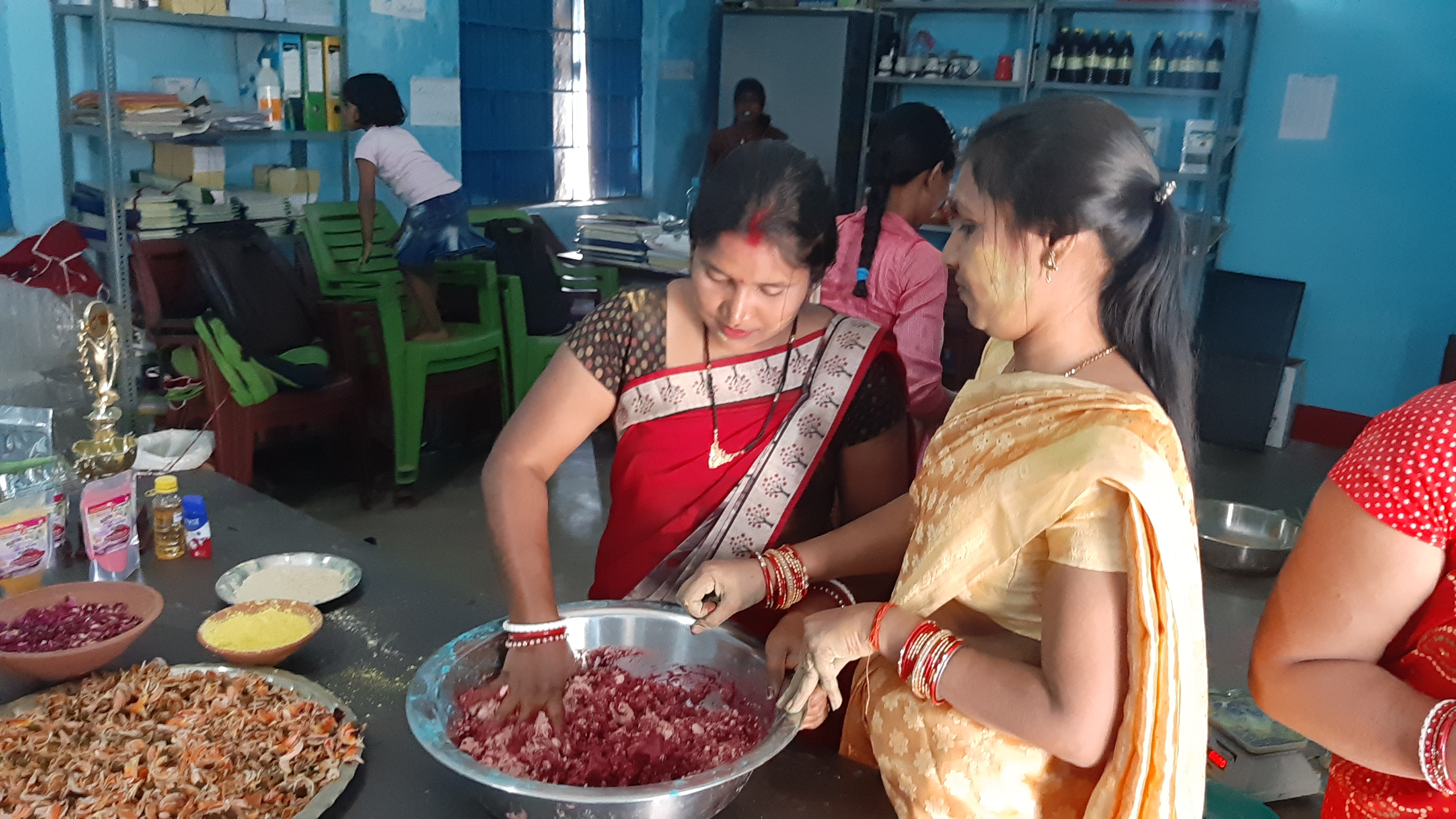 Women of Hazaribag making Gulal of flowers and sandalwood