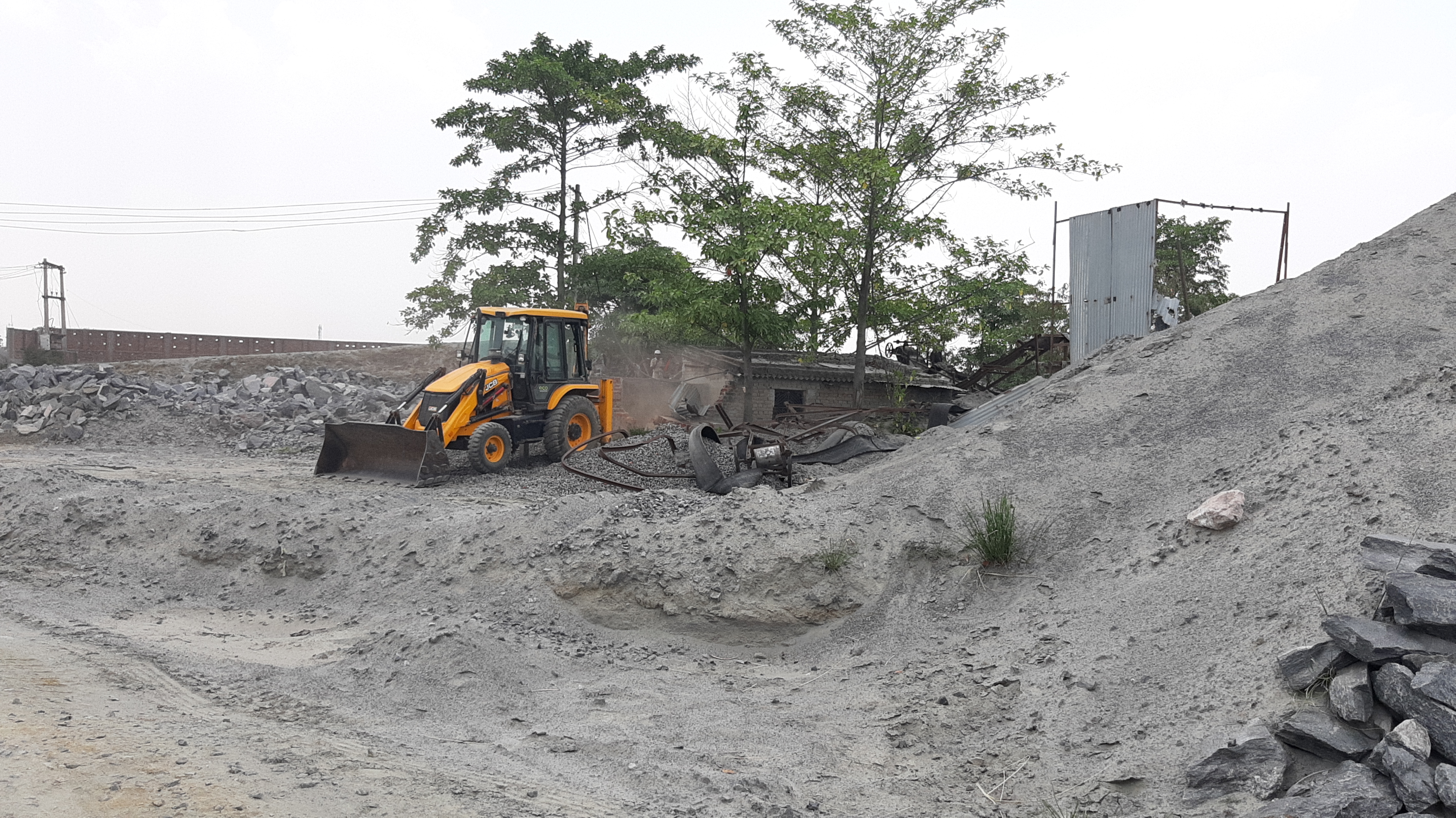 Administration bulldozer action on illegal crushers in Hazaribag