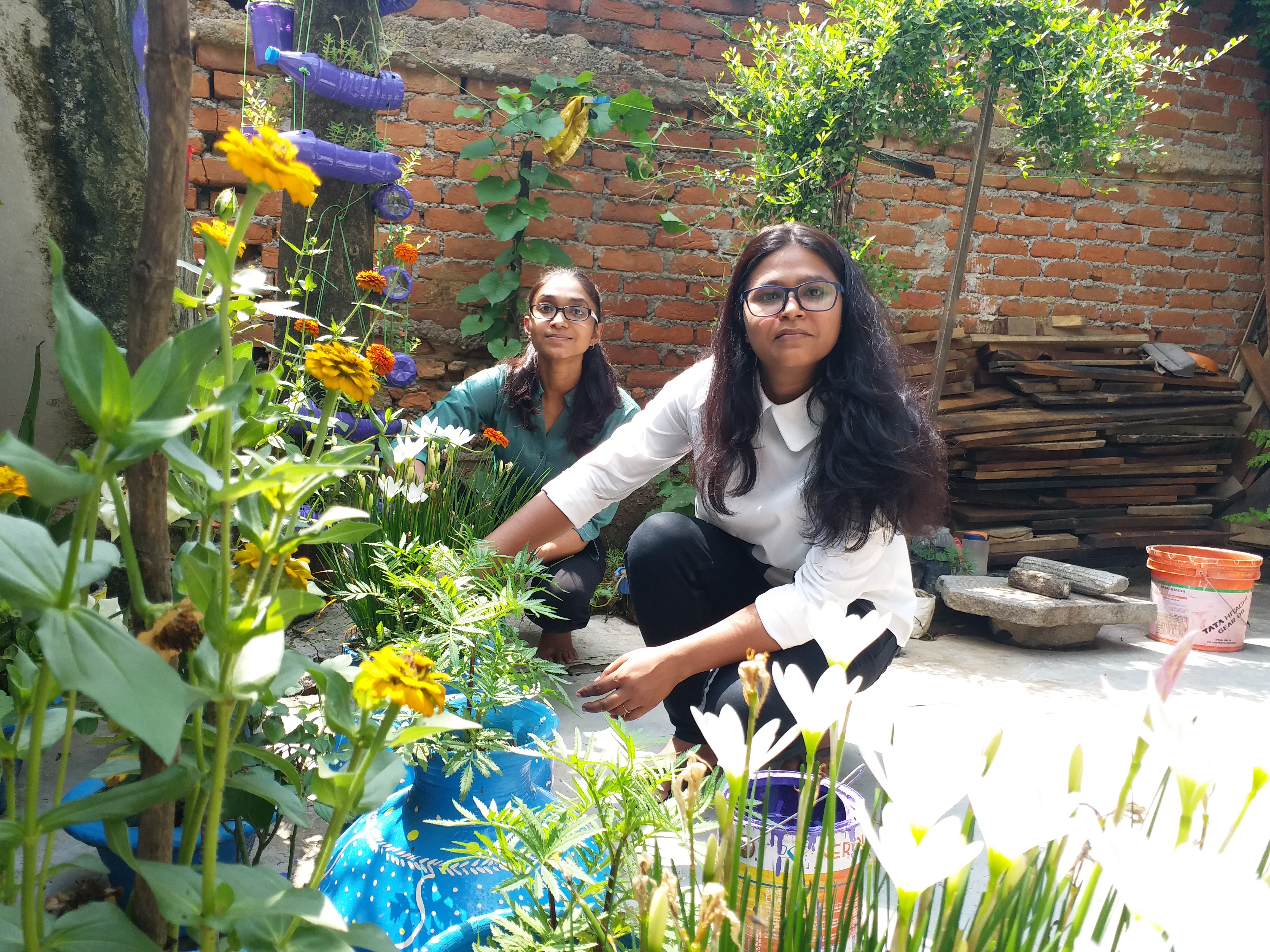 two sisters made beautiful garden from waste material in hazaribag