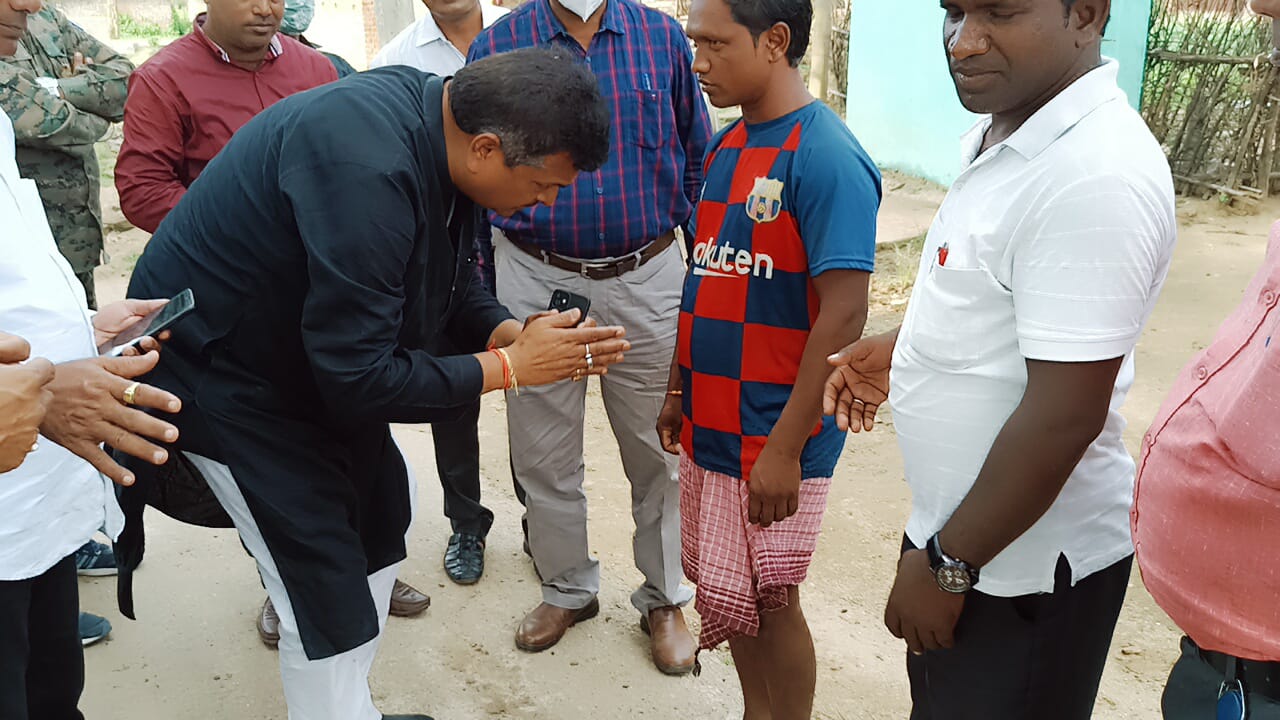 Religion change controversy Hazaribag Sadar MLA touches feet of youth in Chano Khurd village