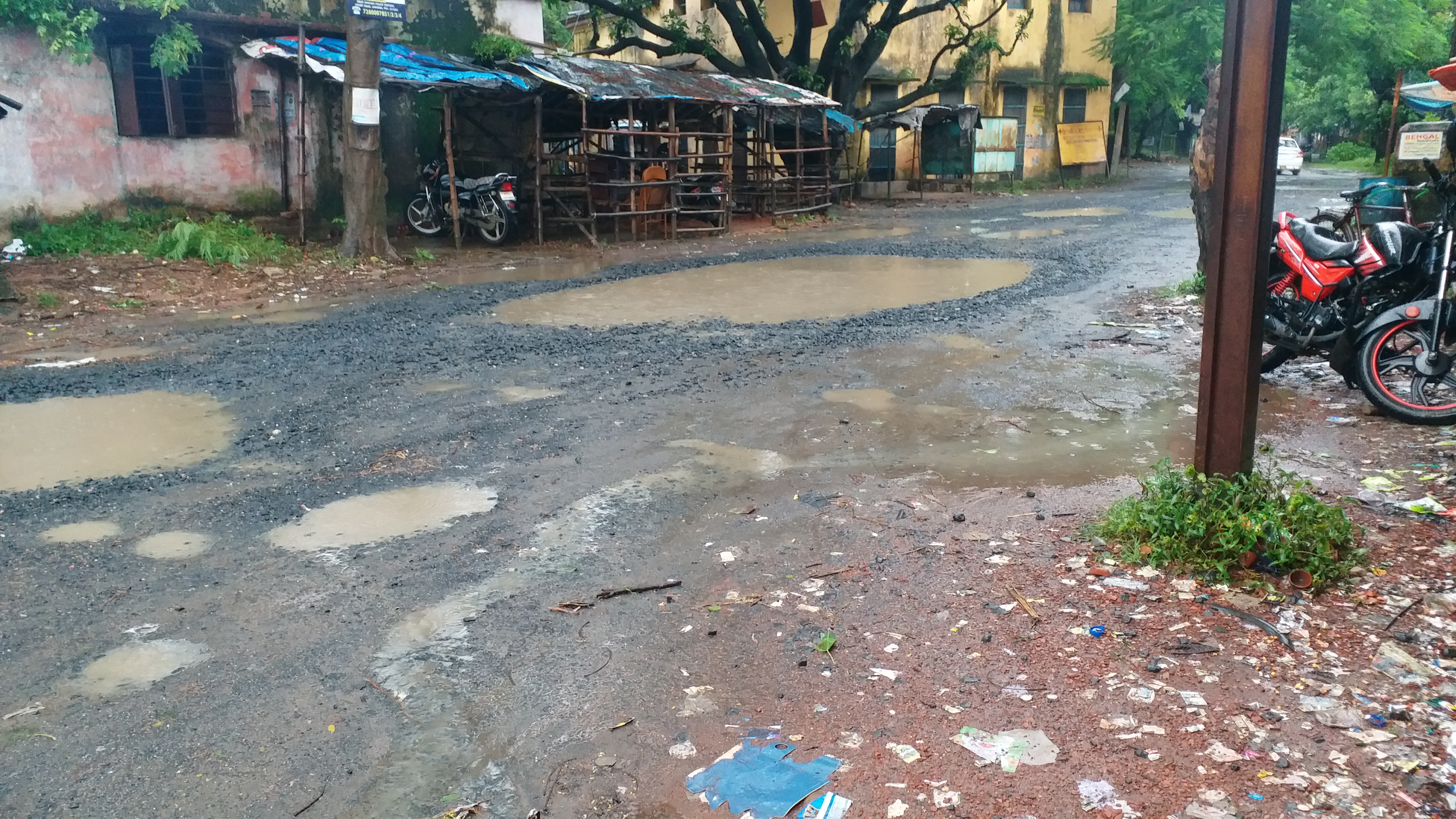 potholes on the road after heavy rain