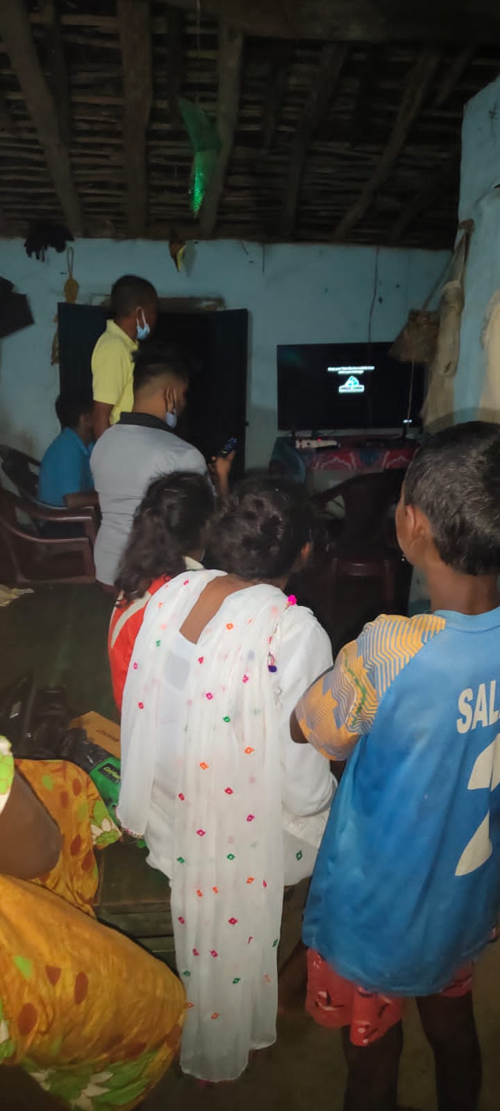 Family happy with TV installed in the house