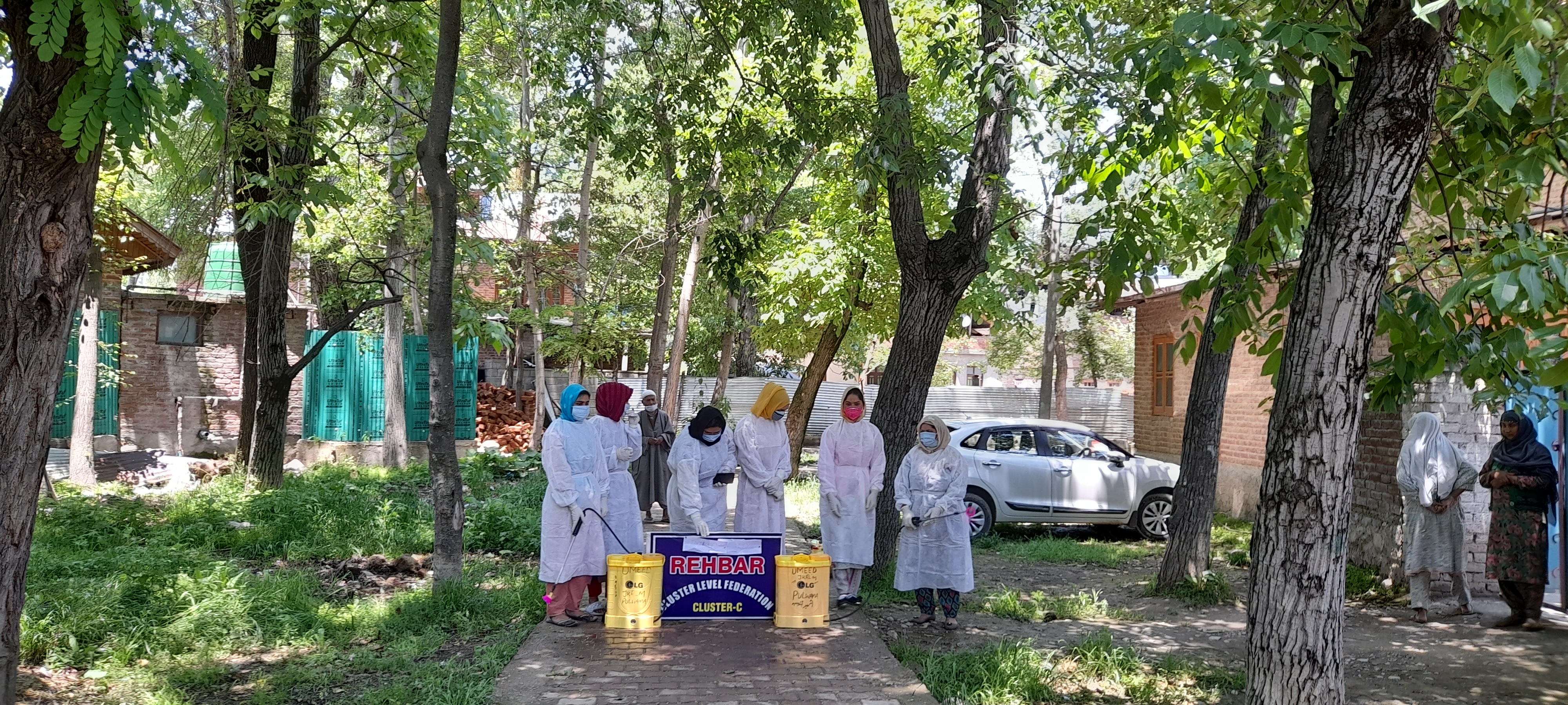 sanitation drive by self help group at wahibugh pulwama