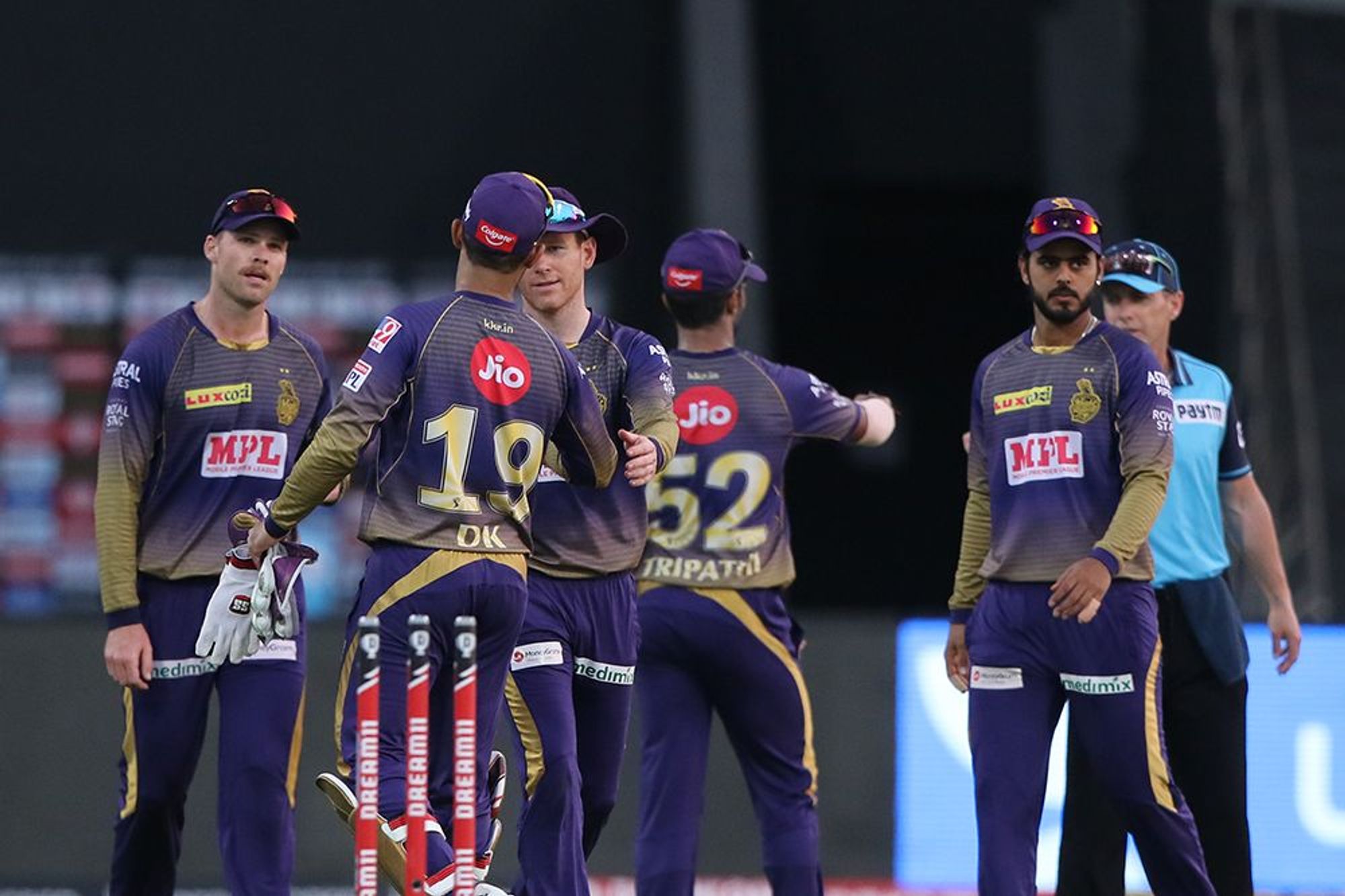 Eoin Morgan and Dinesh Karthik celebrate as KKR beat DC by 59 runs.