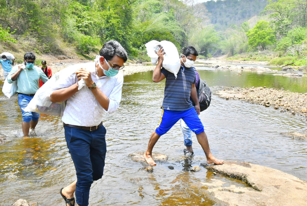 District Collector and MLA trekked kilometres to carry rice and groceries to a tribal settlement