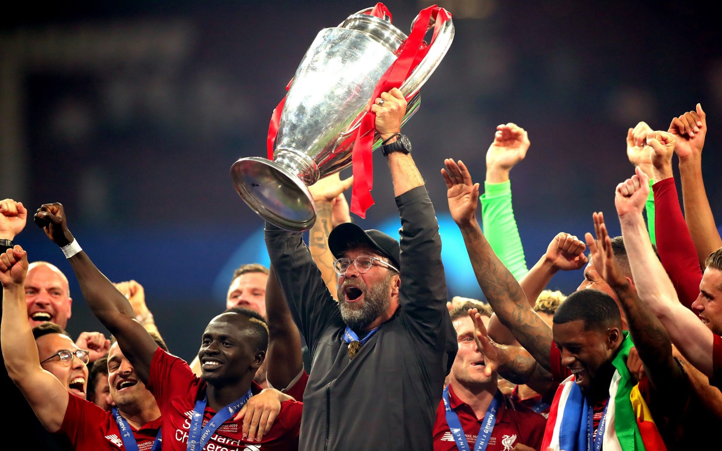 Jurgen Klopp hoists the Champions League trophy which Liverpool won for the first time after 2005.