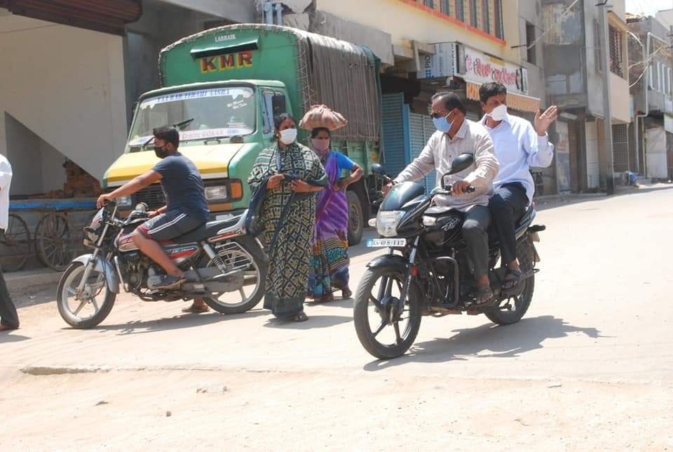 Minister Ramesh Zarakiholi Rounds on a Bike in Gokak City