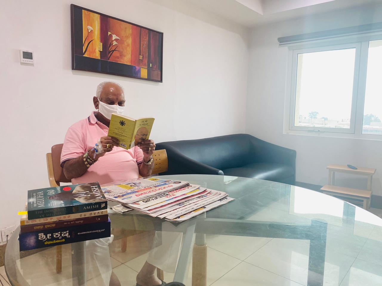 CM Yeddyurappa reading books in Hospital