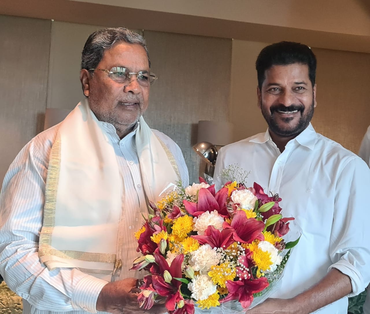 Siddaramaiah, who met Congress Committee President Revant Reddy