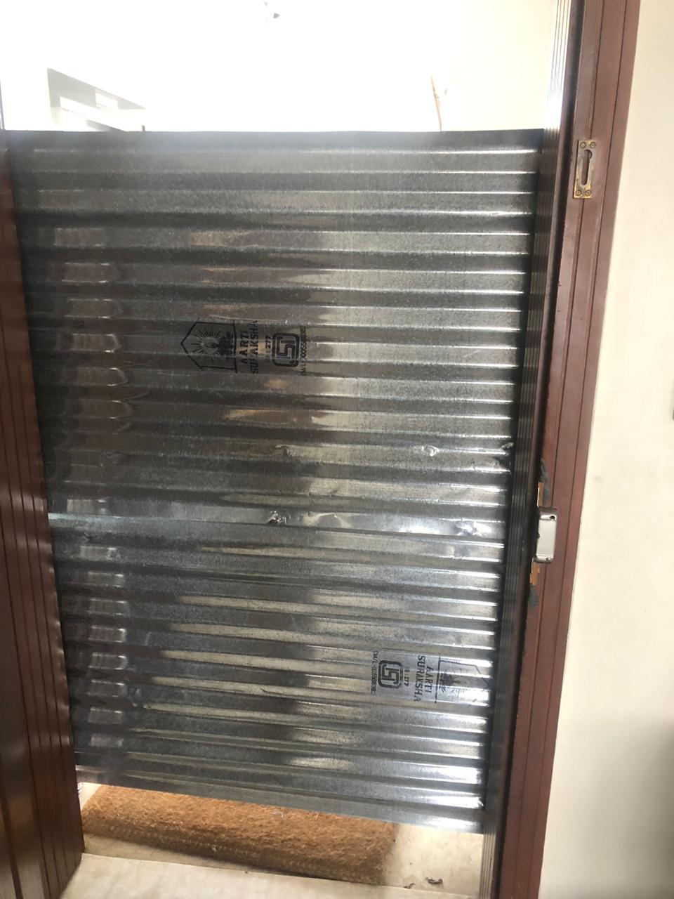 banglore municipality sealed doors of 2 flats with steel sheets in dommalur