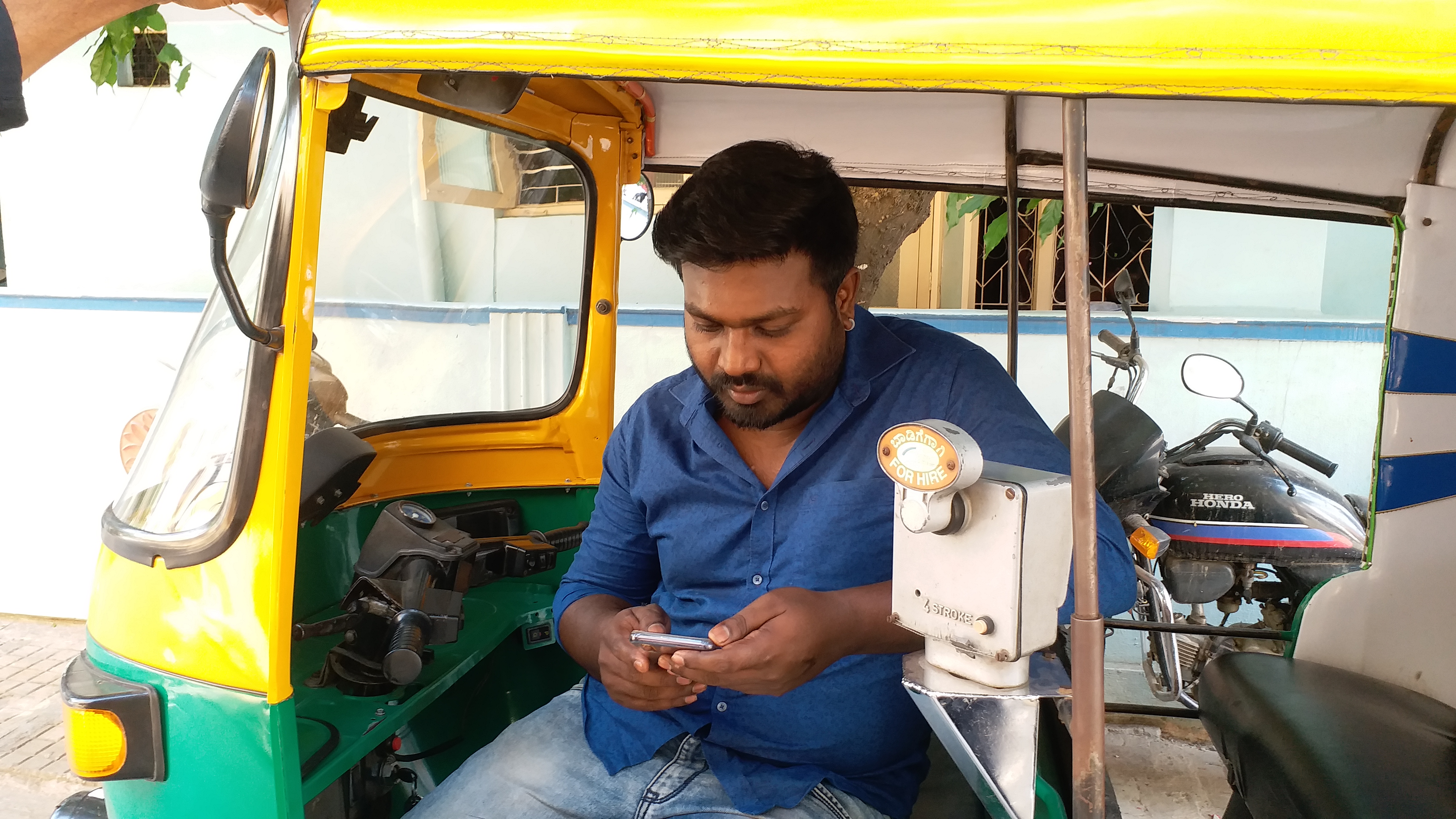 A rescued auto driver of a child in a trash heap