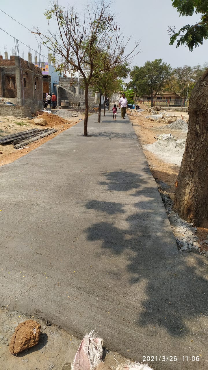 Road constructed around trees, Light pole constructed in drainage: Negligence by gvt officers