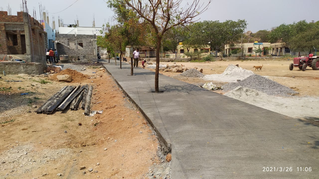 Road constructed around trees, Light pole constructed in drainage: Negligence by gvt officers