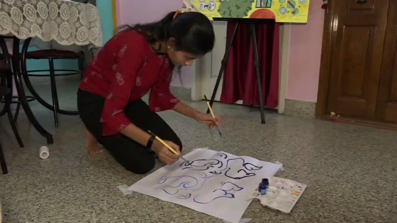 A young lady achievement in painting in Karantaka