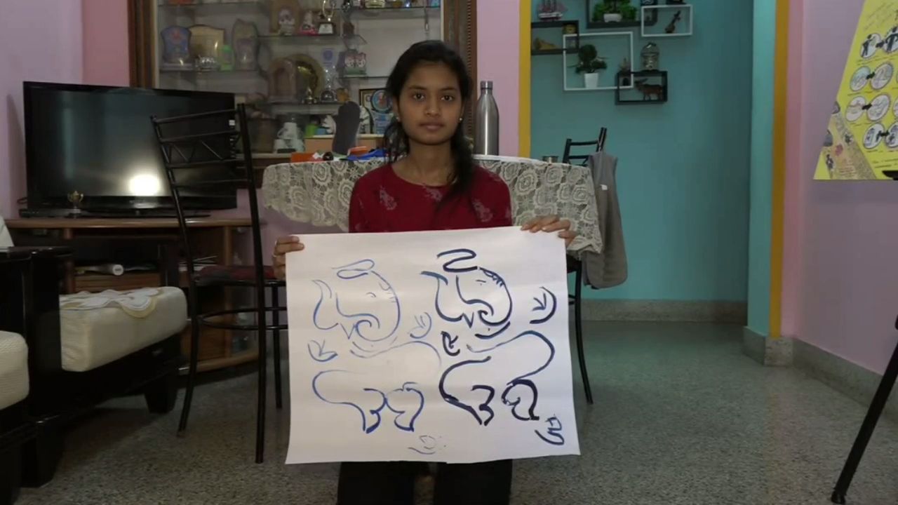 A young lady achievement in painting in Karantaka