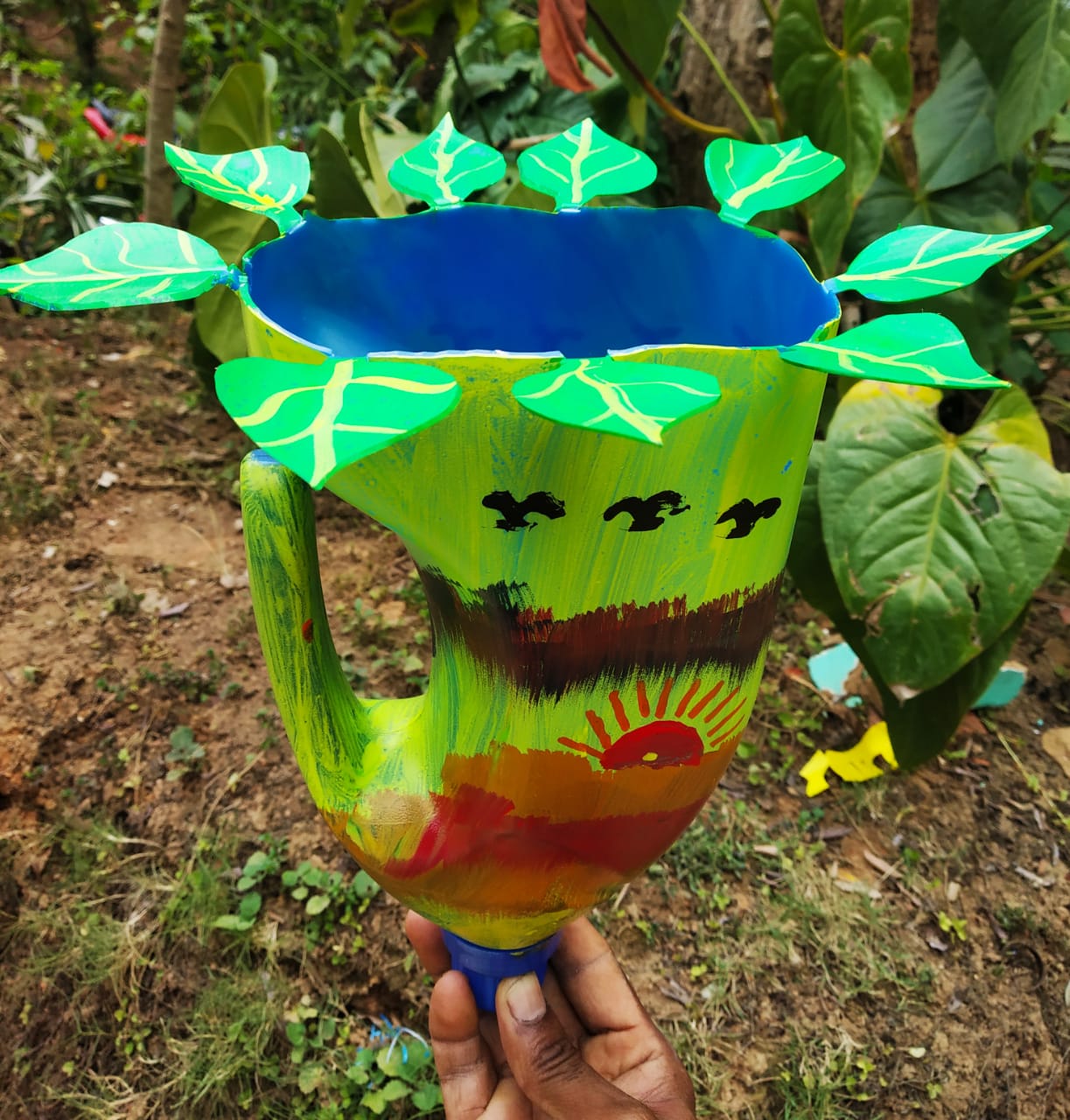 Karnataka teacher creates attractive flower pots from plastic waste