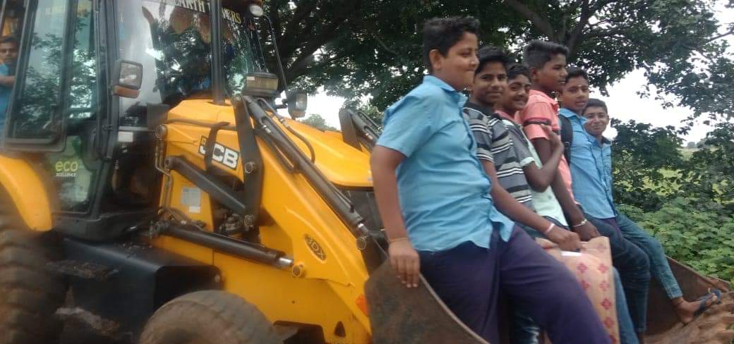 Students went to school in JCB bucket