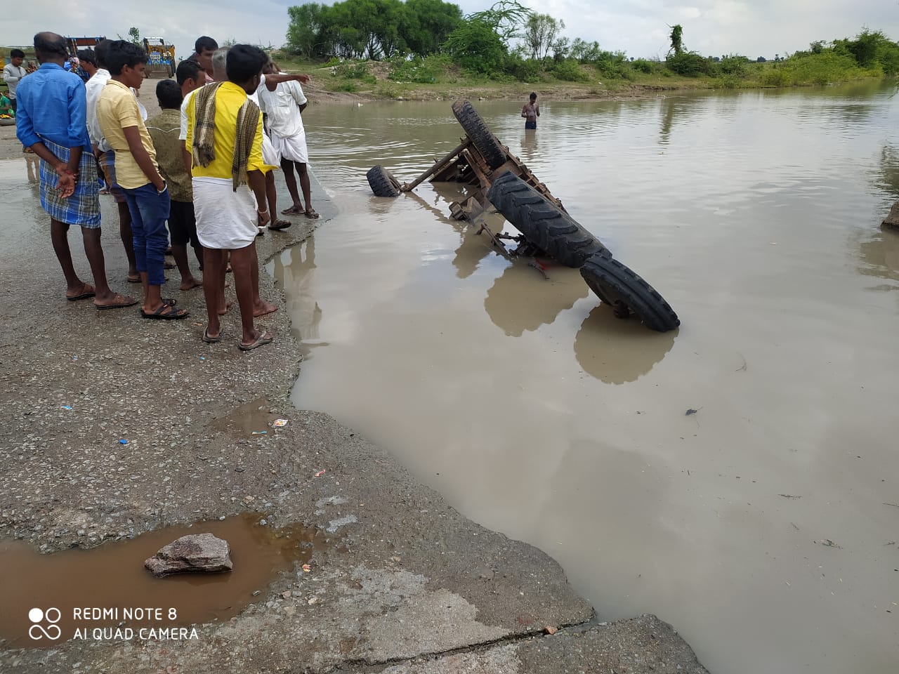 A tractor that rolled over into a stream