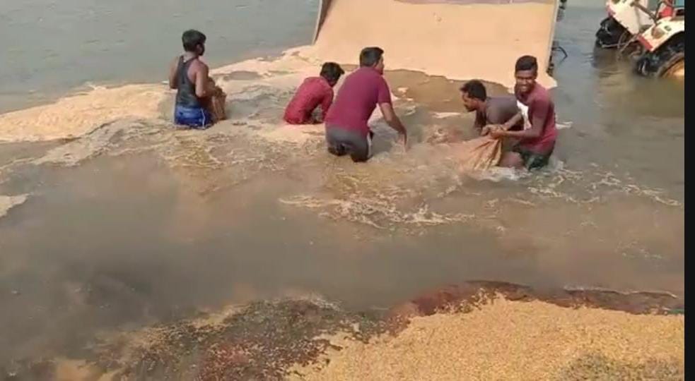 Risky tractor stunt in river