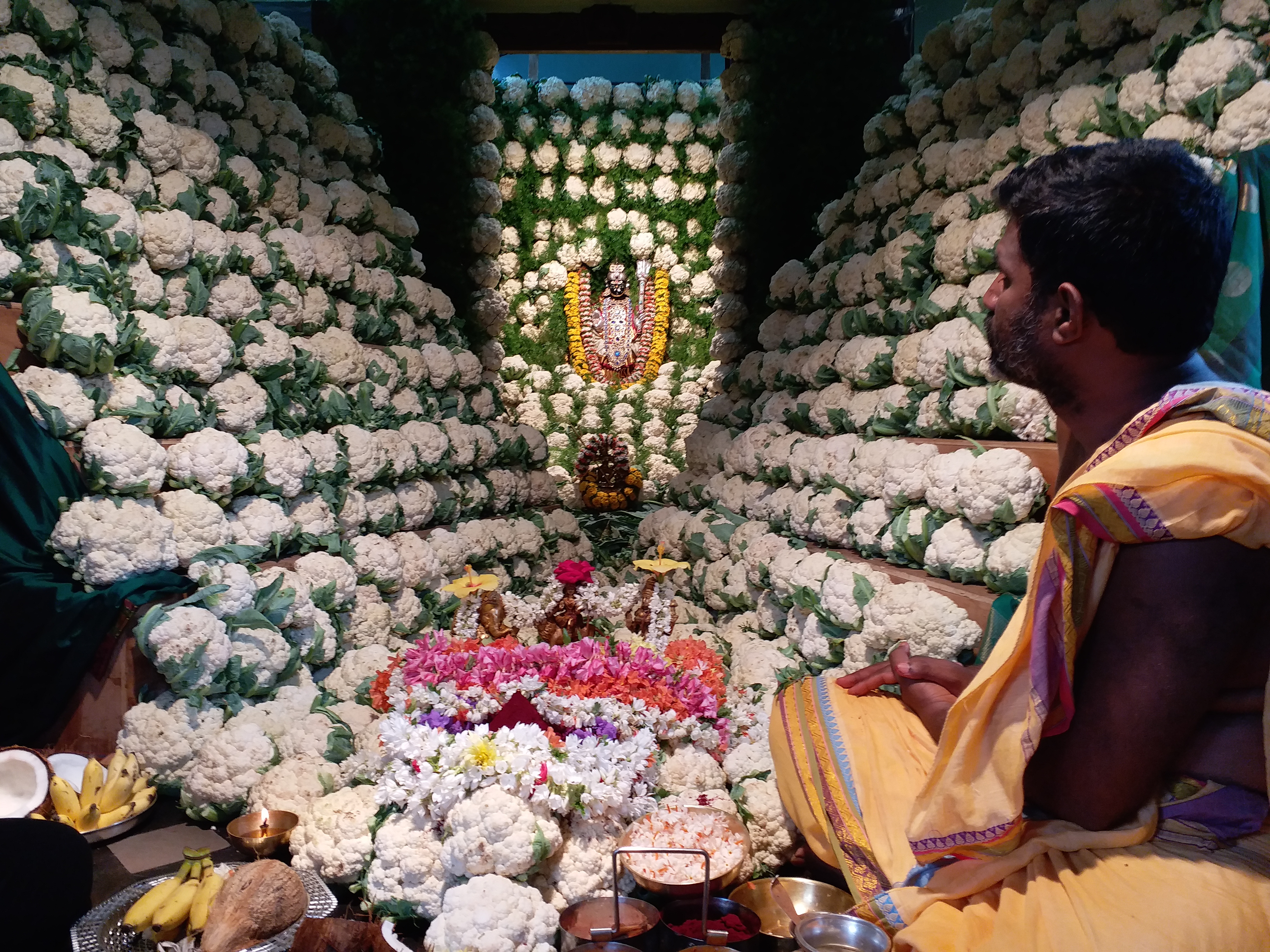 The devotees did Cabbage Decoration to goddess Chamundi to free world from corona in madya, karnataka