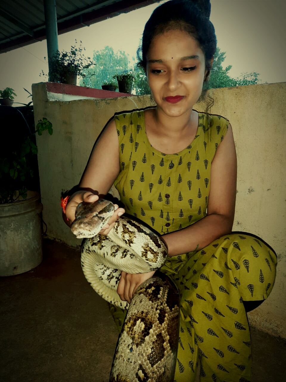 Karnataka Girl catching snakes