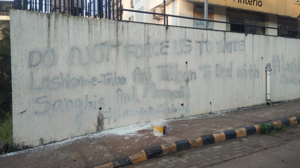 Miscreants graffiti on the wall in support of terrorist groups in Mangalore