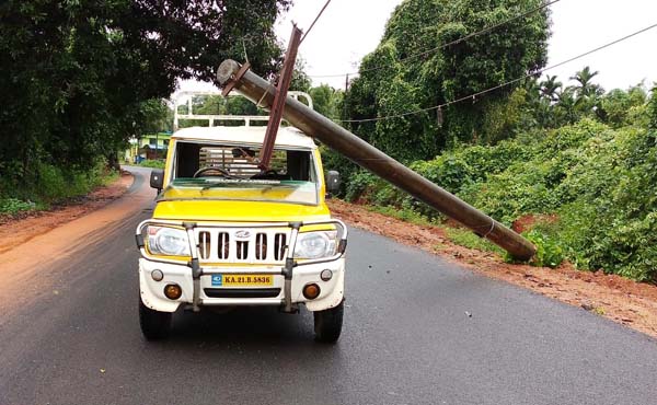 Power pole fallen on the vehicle