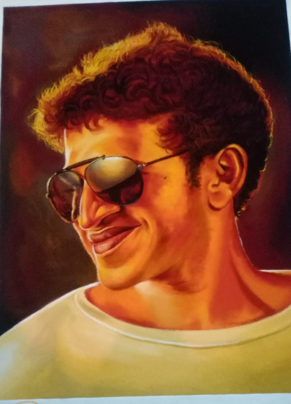 fan draws puneeth photo in rangoli