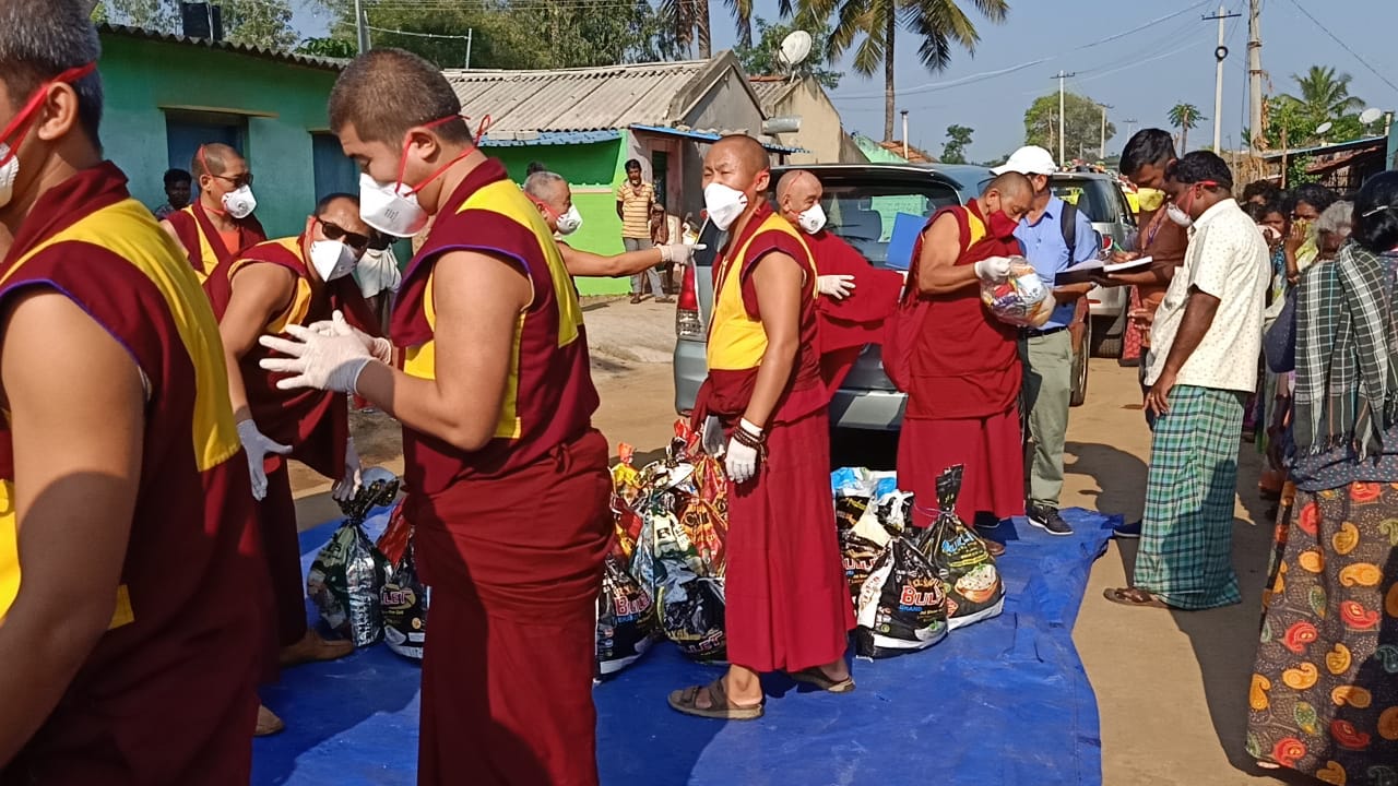 Distribution of food kit from Tibetan camp