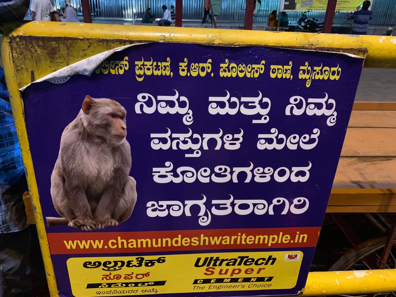 Police notice to people through Warning boards about monkey attack