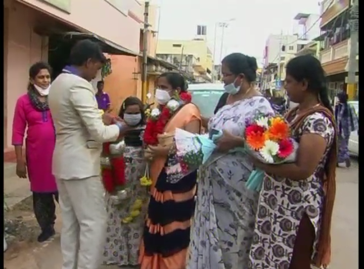 woman felicitating hospital staff